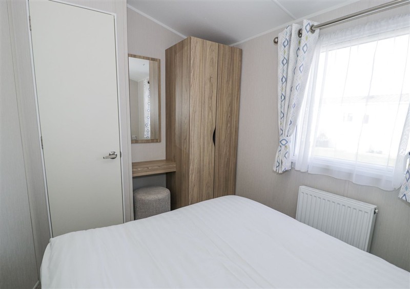 One of the bedrooms at Manor House Platinum 3 Bedroom (16E), Maryport near Aspatria
