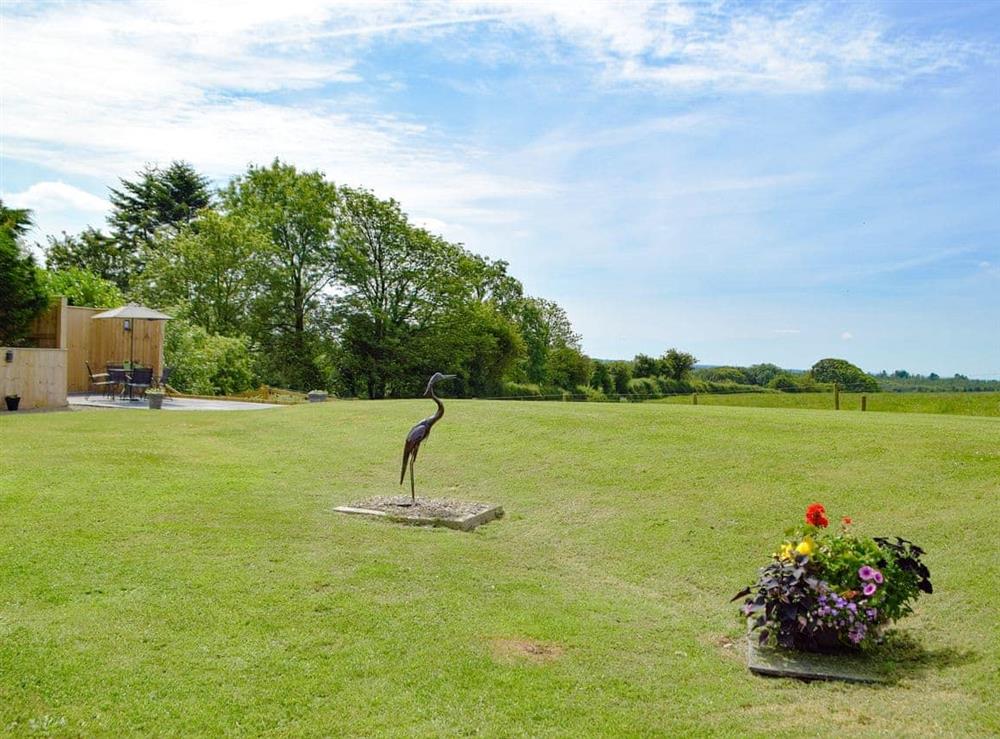 Quirky sculpture looking out across the open fields at Manor Lodge Stables in Wiston, near Haverfordwest, Dyfed