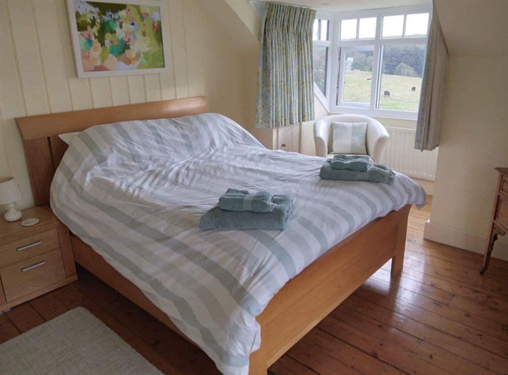 A bedroom in Manorbier Boat House at Manorbier Boat House in Manorbier, Pembrokeshire, Dyfed