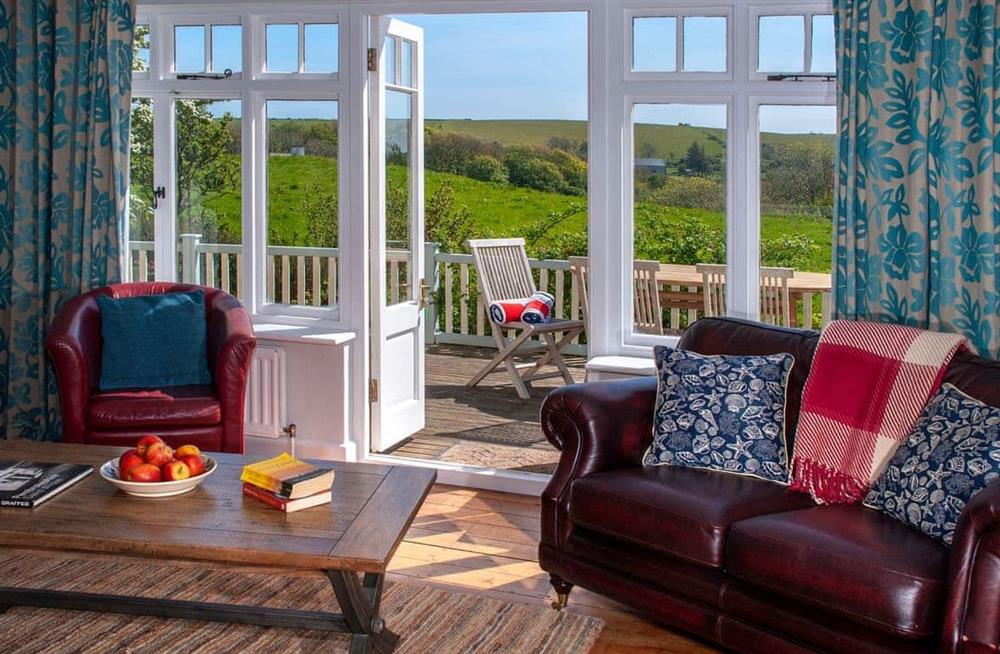Enjoy the living room (photo 2) at Manorbier Boat House in Manorbier, Pembrokeshire, Dyfed