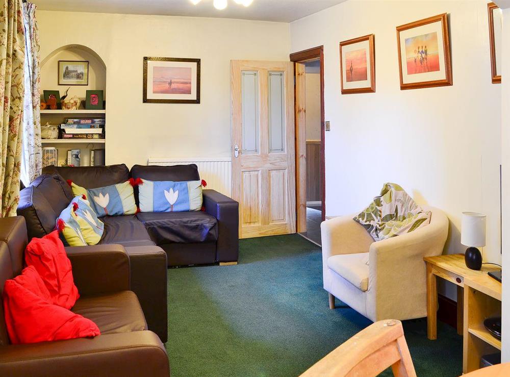 Welcoming living area at Manse Cottage in Corstorphine, Edinburgh, Midlothian