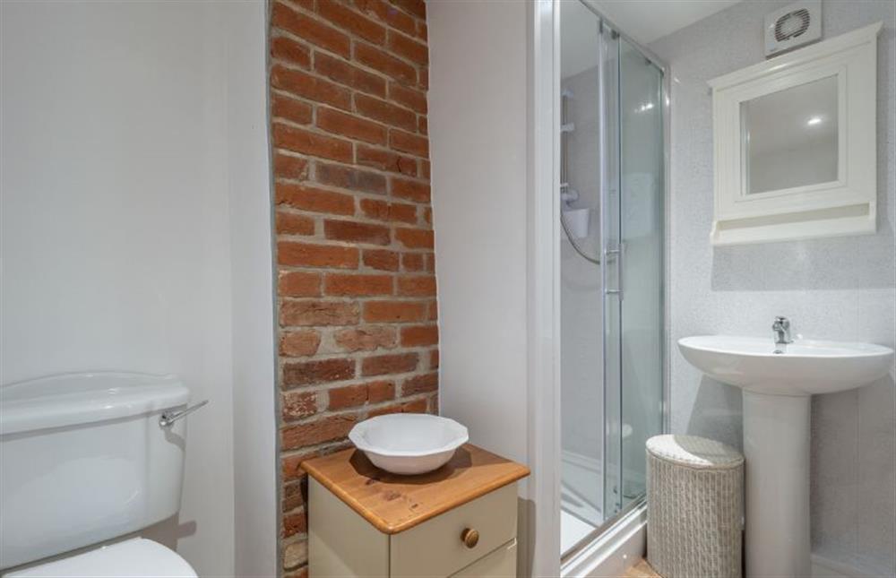 First floor: Shower room with wash basin and WC at Margarets Cottage, Potter Heigham near Great Yarmouth