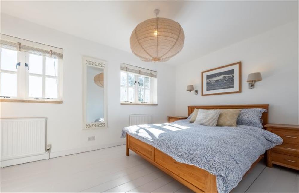 Marigold Cottage  - Light and airy master bedroom with a king-size bed  at Marigold Cottage, Docking near Kings Lynn