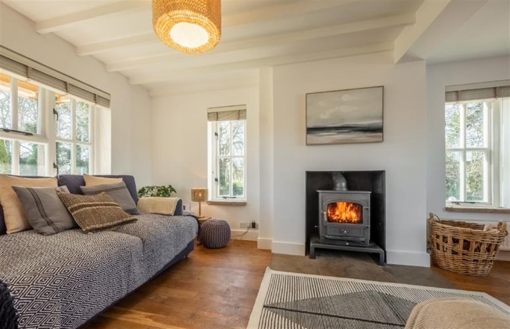 Marigold Cottage - Stylish, relaxing sitting room with a wood burning stove and plenty of comfy seating 