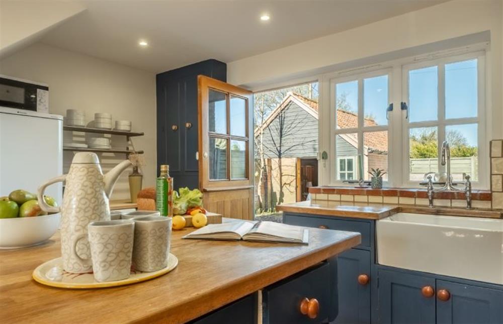 Marigold Cottage  - The country kitchen with wooden worktops and a butlers sink  at Marigold Cottage, Docking near Kings Lynn