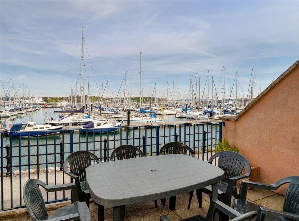 Terrace with outdoor furniture at Marina View in Mount Batten, near Plymouth, Devon