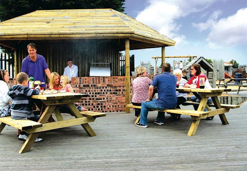 Outdoor barbecue area at Marine Park in Rhyl, North Wales & Snowdonia