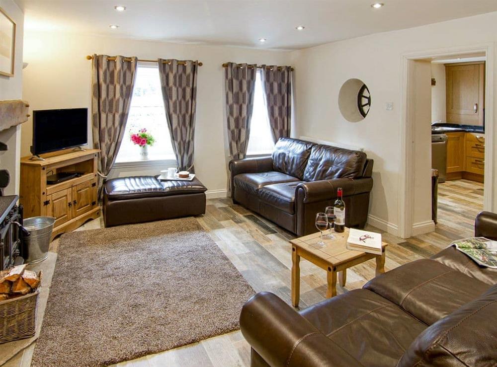 Cosy and welcoming living room at Mariners Cottage in Lindale, near Grange-over-Sands, Cumbria