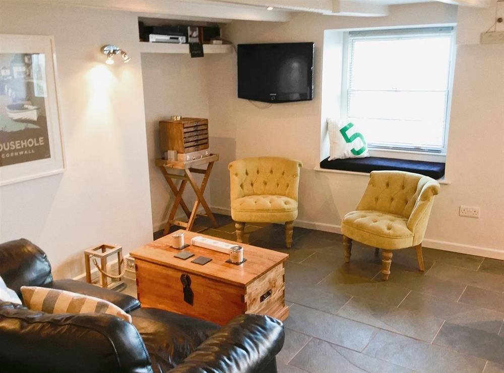 Living room at Mariners Cottage in Mousehole, Penzance, Cornwall., Great Britain