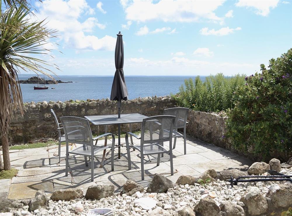 Sitting-out-area at Mariners Cottage in Mousehole, Penzance, Cornwall., Great Britain