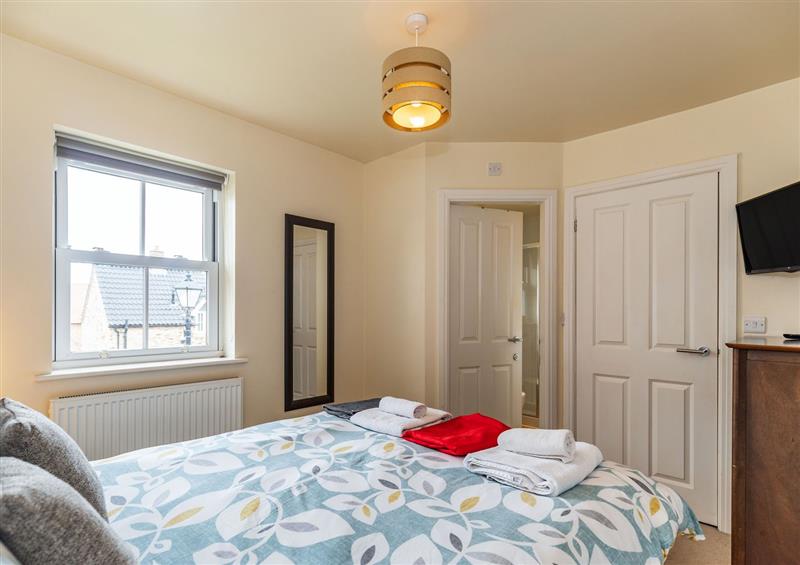 This is a bedroom (photo 2) at Maris Cottage, Filey