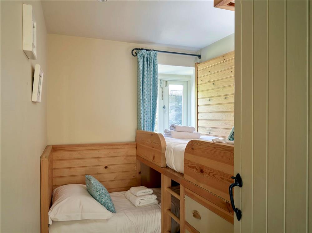 Bedroom three, with L-shaped cabin beds, suitable for under 12’s only at Maristow Cottage, Dartmouth 