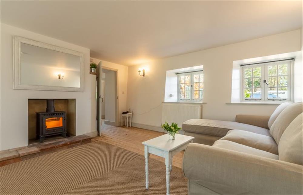 First floor: Sitting room has a wood burning stove at Market Square House, Fring near Kings Lynn