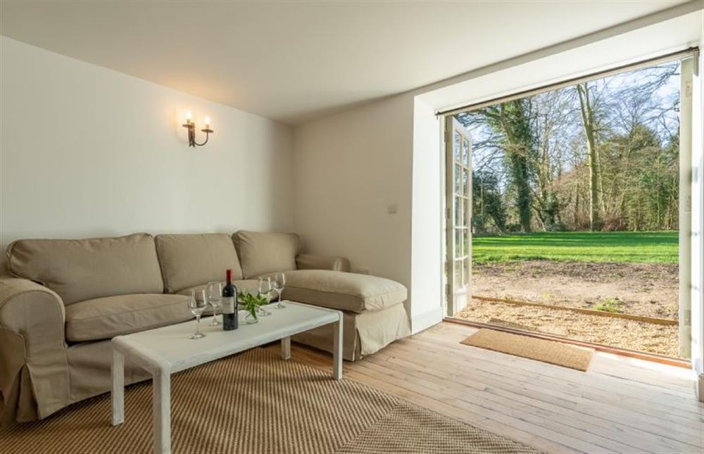 First floor: Sitting room with french doors leading onto the terrace at Market Square House, Fring near Kings Lynn
