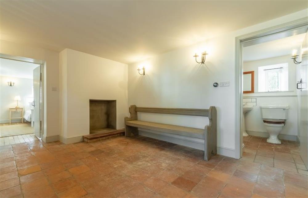 Ground floor: Main entrance hall with bench with door to WC at Market Square House, Fring near Kings Lynn