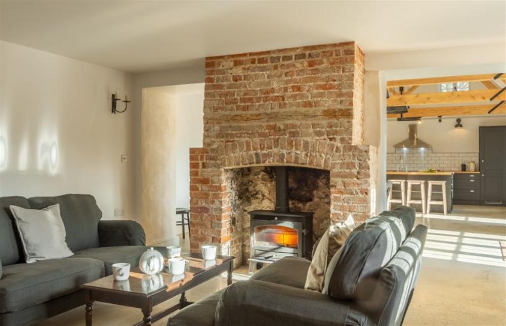 Ground floor: Snug with wood burning stove at Market Square House, Fring near Kings Lynn