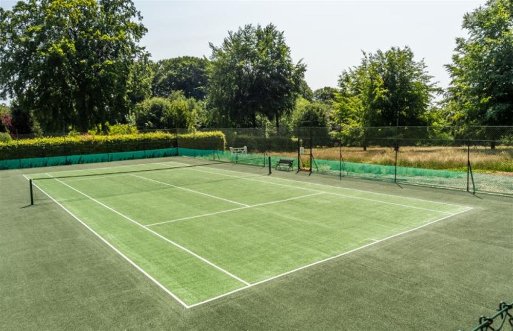 Tennis court for shared guest use at Market Square House, Fring near Kings Lynn