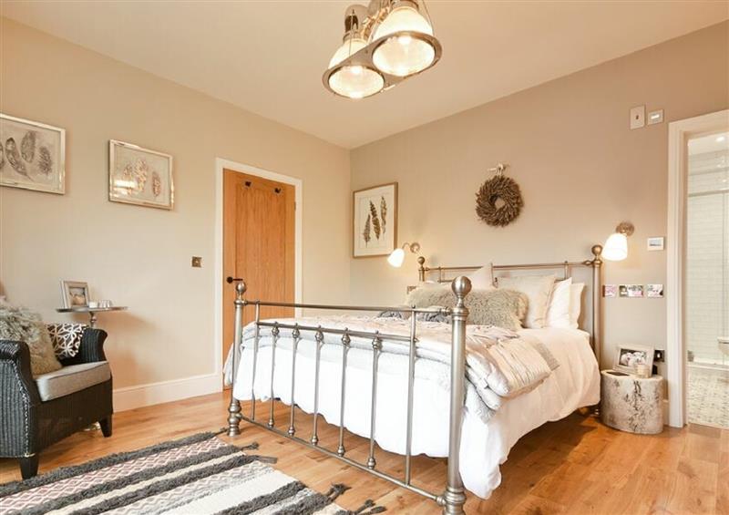 A bedroom in Marmalade Cottage at Marmalade Cottage, Seahouses