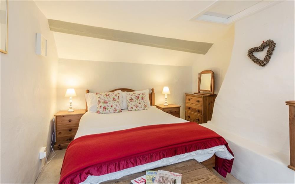 Bedroom 1 with 4ft 6inch double bed at Marquis of Lorne Cottage in Bridport