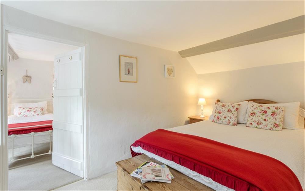 Bedroom 2 is located off bedroom 1 at Marquis of Lorne Cottage in Bridport