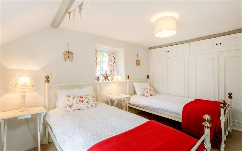 Bedroom 2 with twin 3ft beds.   at Marquis of Lorne Cottage in Bridport
