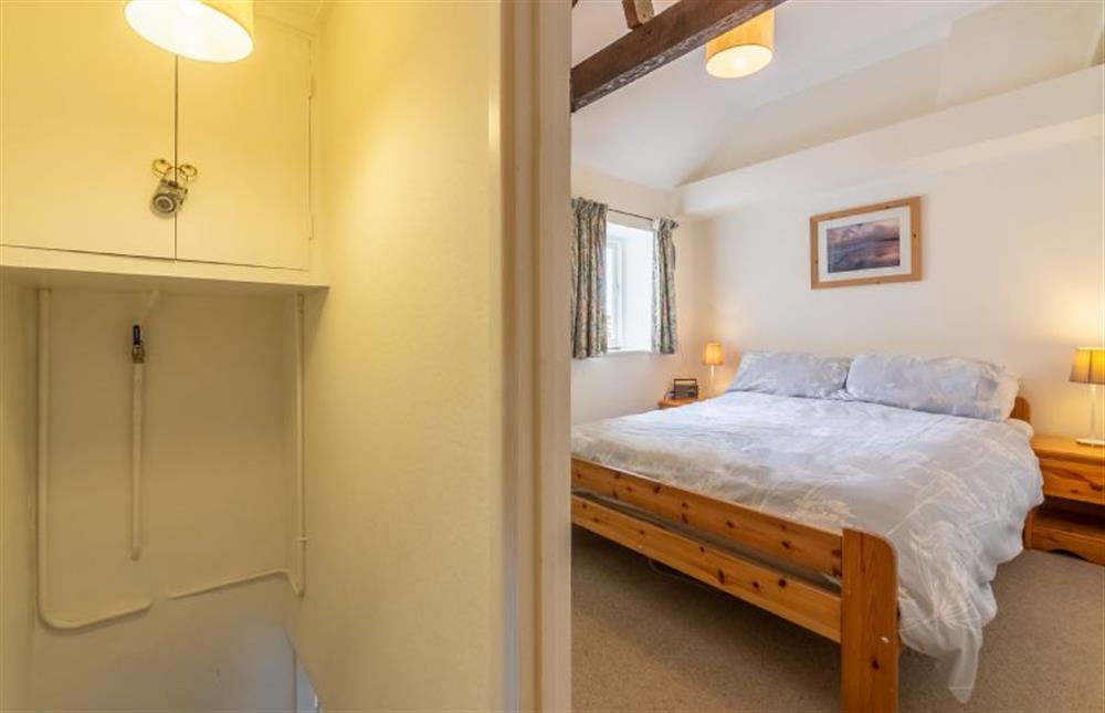 The Master bedroom at the top of the steep stairs at Marram Cottage, Brancaster Staithe near Kings Lynn