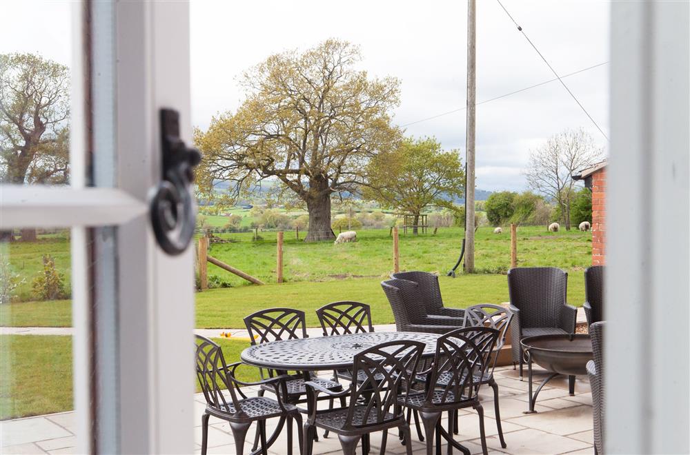 Enjoy views of the garden and surrounding countryside at Marrington Farmhouse, Montgomery