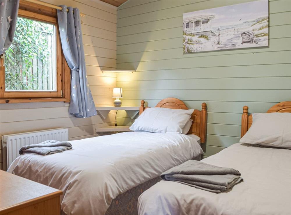 Twin bedroom at Marros Hill Log Cabin in Marros, near Laugharne, Dyfed