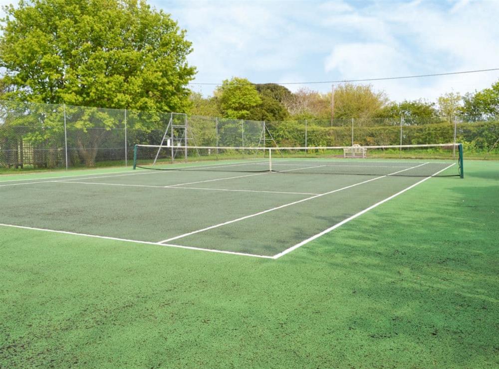 Tennis court at Marsh Barn in Brancaster, Norfolk., Great Britain