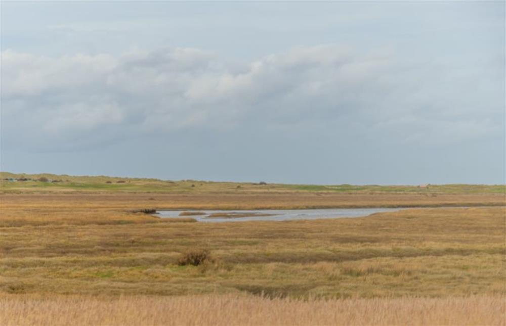 Ground floor:  Views of the salt marsh from the open-plan living area at Marsh Retreat, Brancaster near Kings Lynn