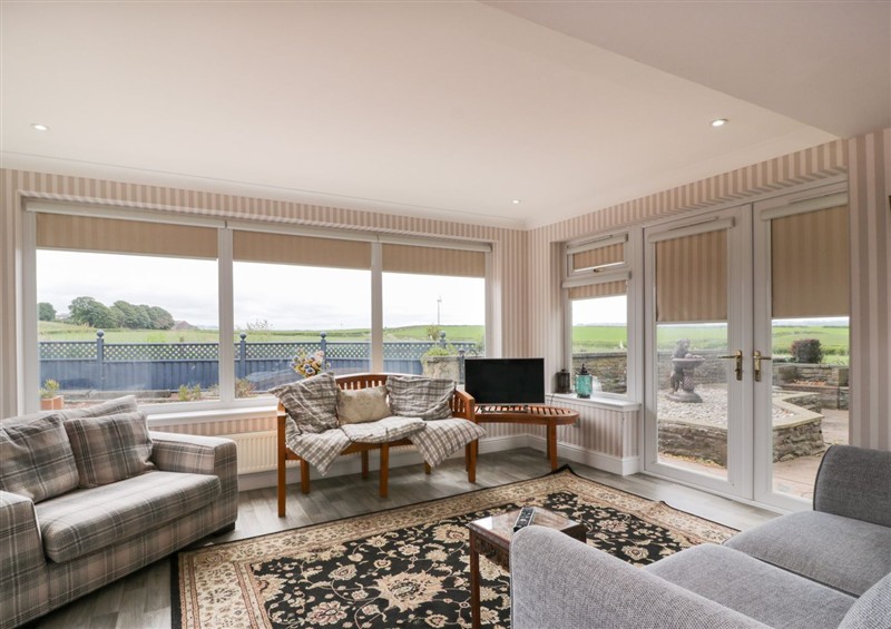 Relax in the living area (photo 2) at Marshill Farm House, Draffan near Kirkmuirhill
