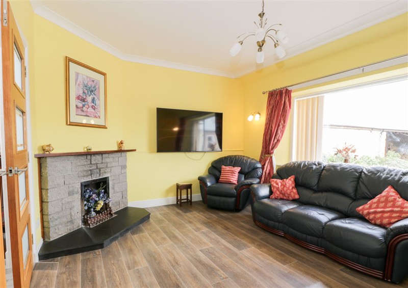 Relax in the living area at Marshill Farm House, Draffan near Kirkmuirhill