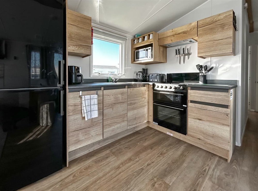 Kitchen area (photo 2) at Martins Holiday Haven in Camber, East Sussex