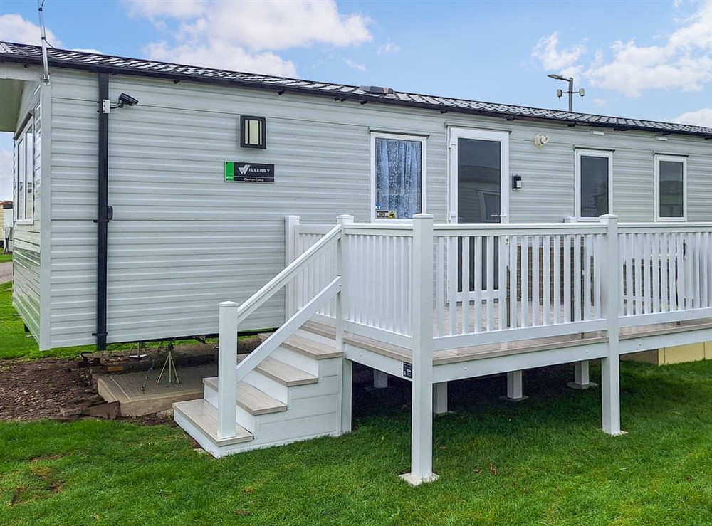 Outside with decking at Martins Holiday Haven in Camber, East Sussex