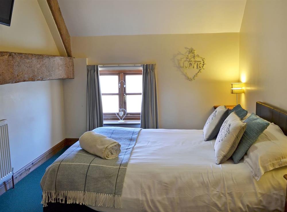 Romantic double bedroom at Shire Cottage, 