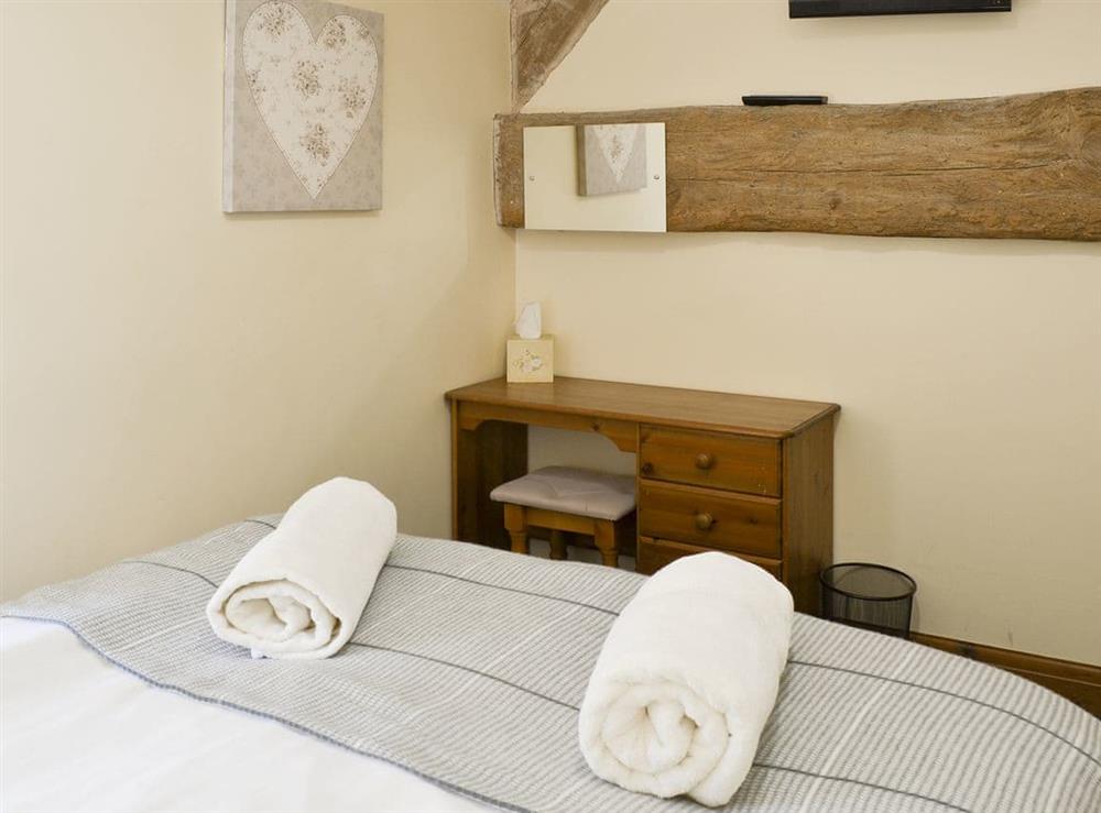Characterful exposed wood beams in the double bedroom at Suffolk Punch, 
