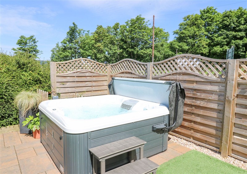 Enjoy the hot tub at Maryland Cottage, Abernethy