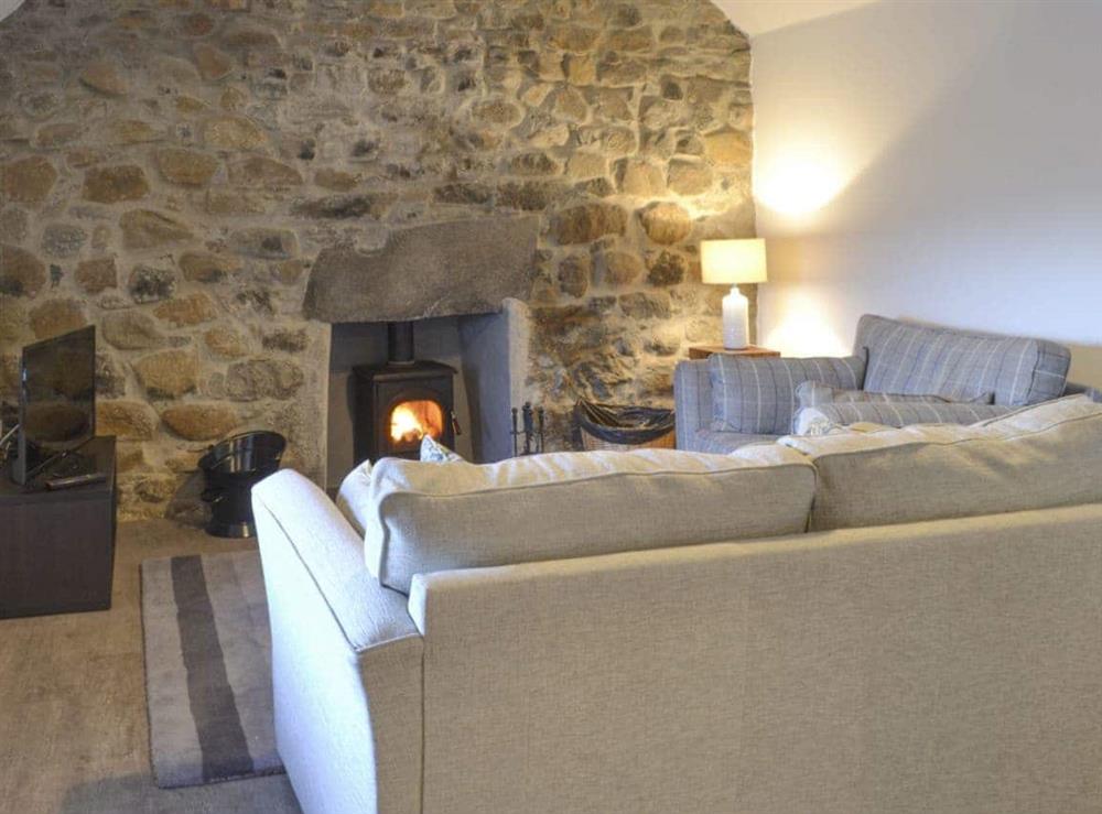 Warm and welcoming living area at Marys Cottage in Clachan, Staffin, Isle Of Skye