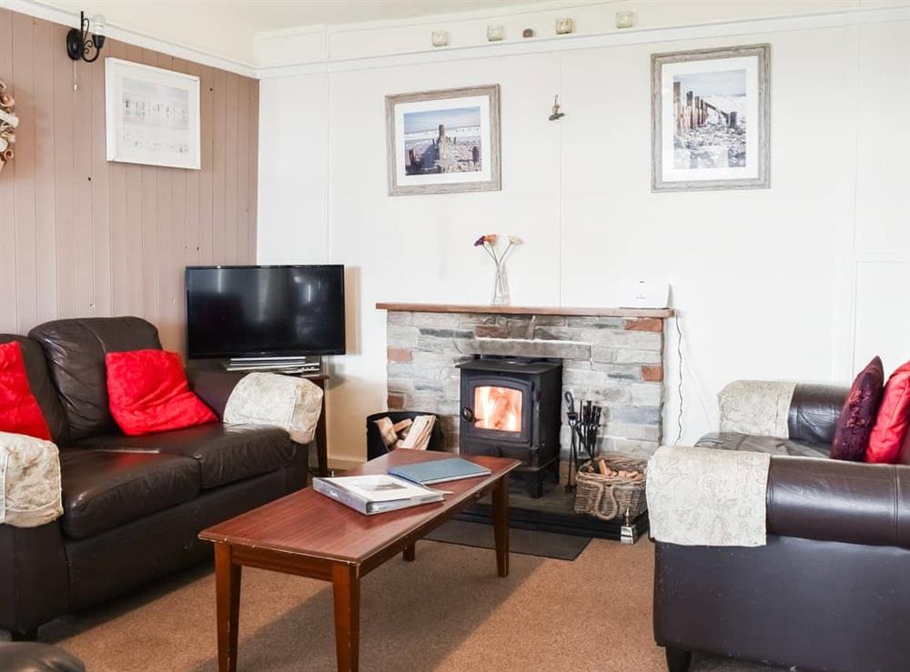 Living area at Maskell Beach Cottage in Ulverston, Cumbria