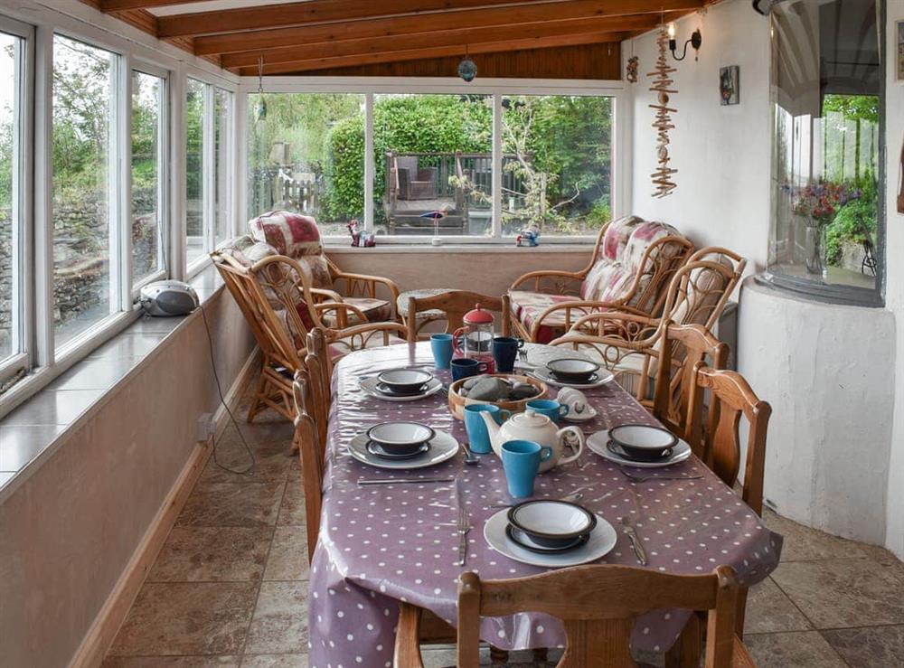 Sun room at Maskell Beach Cottage in Ulverston, Cumbria