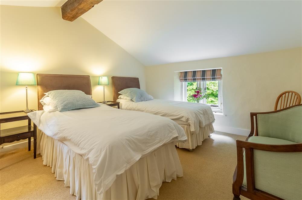 Twin bedroom with 3’ zip and link beds at Masongill Lodge, Masongill