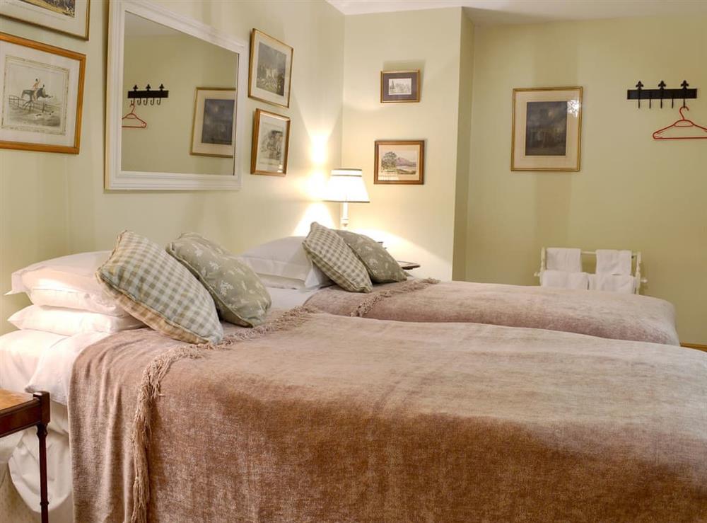 Twin bedroom with character at Mill Farmhouse, 