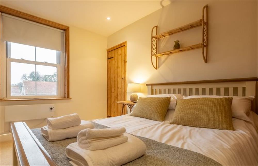Bedroom two with 5’ king-size bed at Maurice Cottage, Docking near Kings Lynn