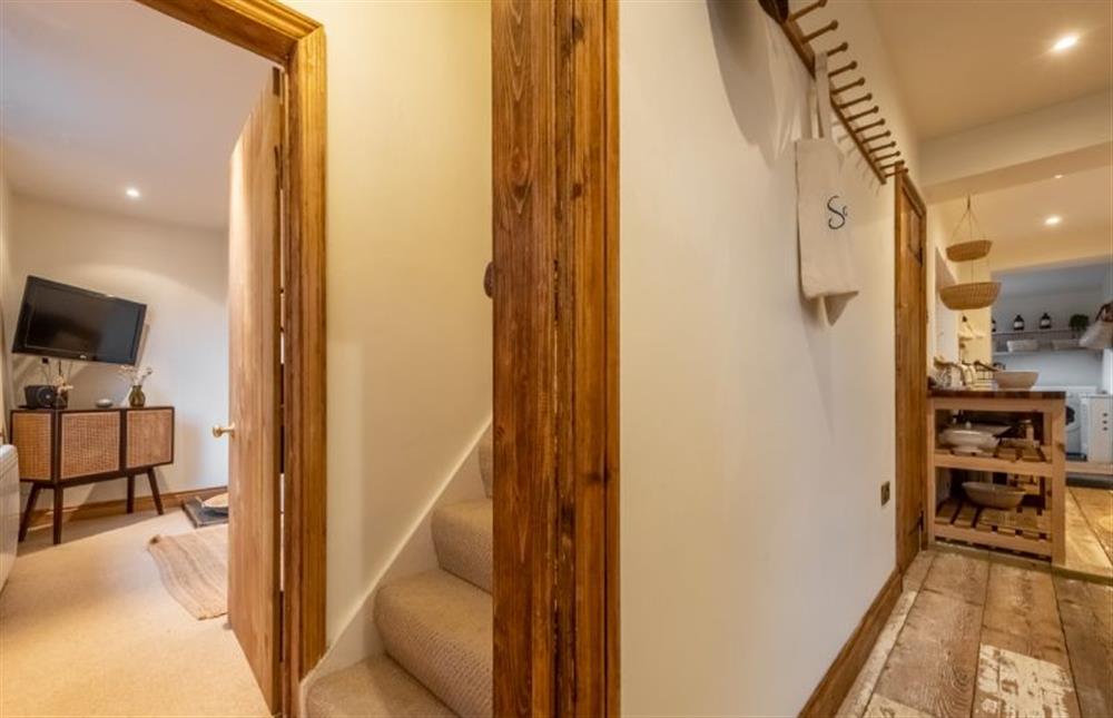 Front hallway with stairs to the first floor at Maurice Cottage, Docking near Kings Lynn