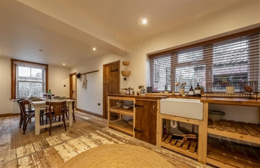 There is a step between the kitchen and dining area at Maurice Cottage, Docking near Kings Lynn