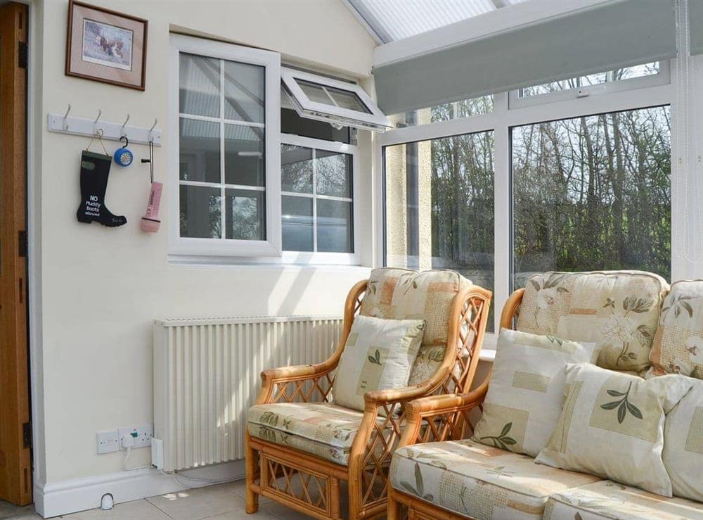 Lovely and sunny conservatory at Mavis Cottage in Kingswood, near Kington, Herefordshire