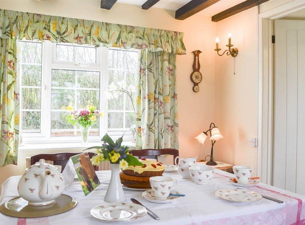Pretty cottage style dining room at Mavis Cottage in Kingswood, near Kington, Herefordshire