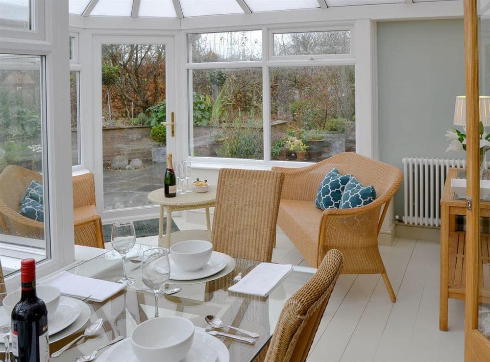 Light and airy conservatory/ dining room (photo 2) at May Cottage in Bacton, Nr North Walsham, Norfolk., Great Britain