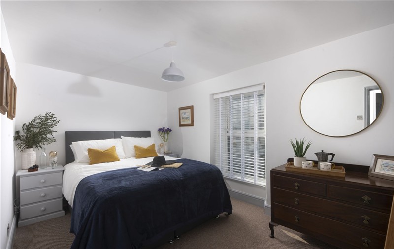 A bedroom in May Cottage (photo 2) at May Cottage, Cornwall