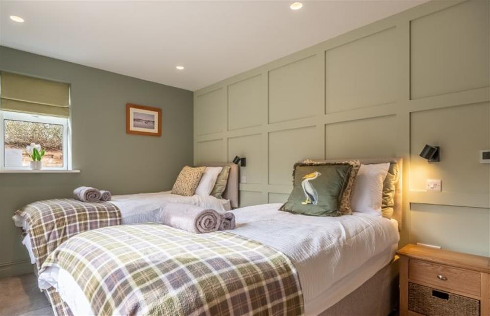 Bedroom two, with 3’ twin single beds (can be configured as a 6’ super-king size bed on request), overlooking the beautiful views 